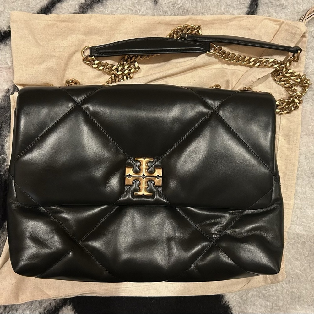 Tory Burch Black leather Kira Diamond quilted convertible shoulder bag.